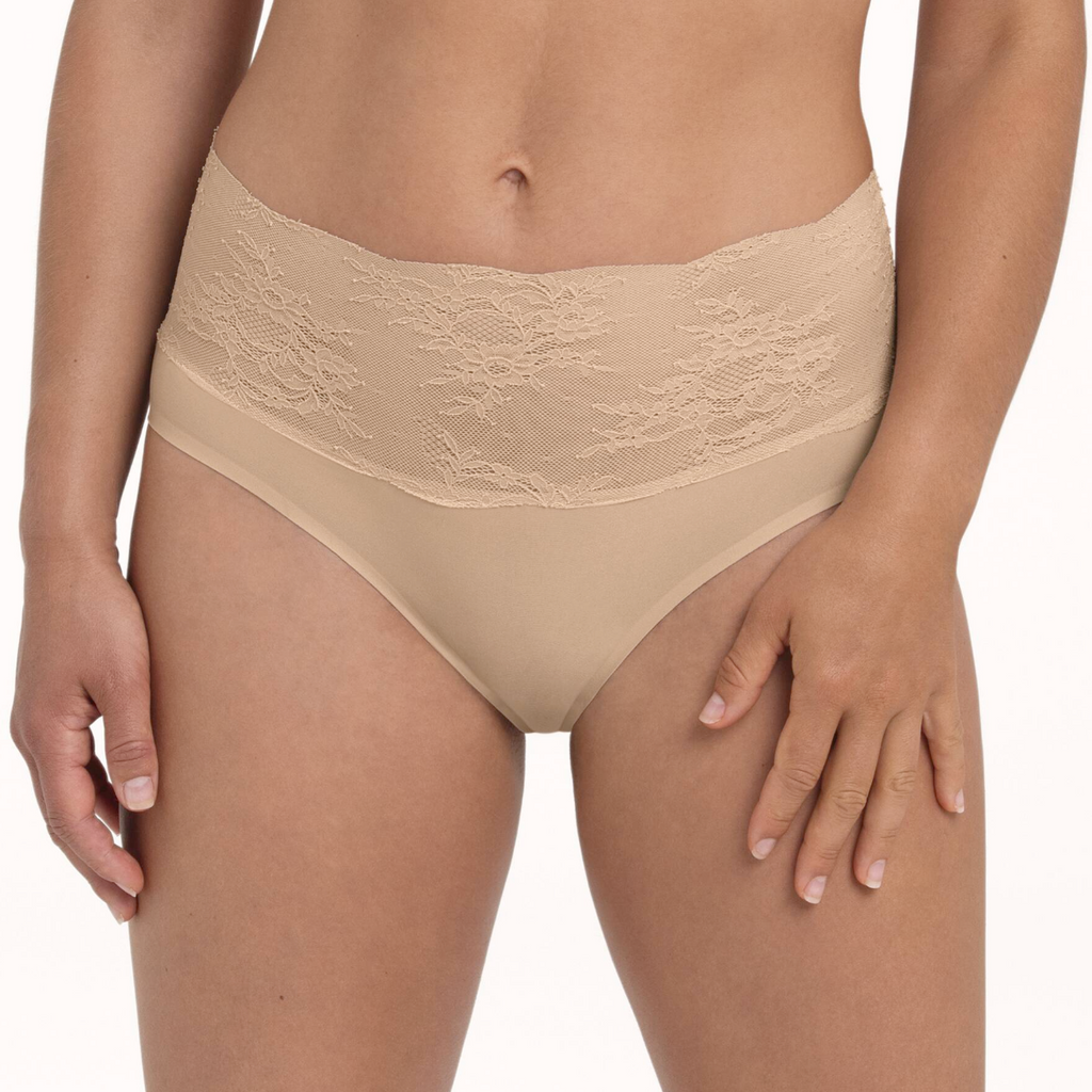 Beige lace underwear on a white background